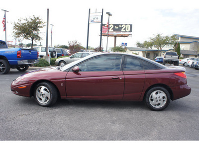 saturn s series 2002 red coupe sc2 gasoline 4 cylinders front wheel drive automatic 76543