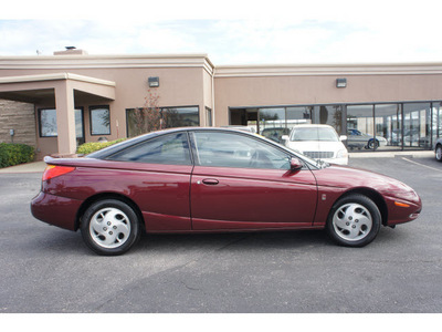 saturn s series 2002 red coupe sc2 gasoline 4 cylinders front wheel drive automatic 76543