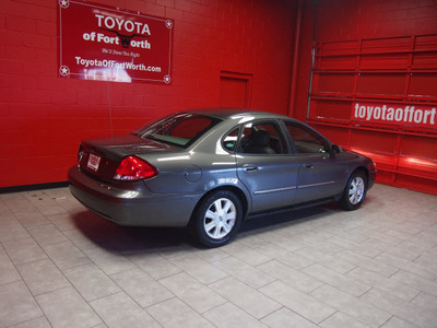 ford taurus 2004 green sedan sel gasoline v6 24v front wheel drive automatic with overdrive 76116