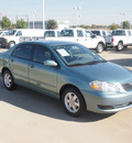 toyota corolla 2007 lt  green sedan le gasoline 4 cylinders front wheel drive automatic with overdrive 76108