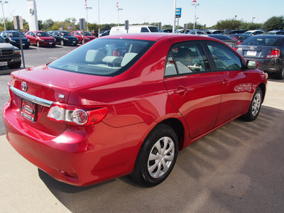 toyota corolla 2011 red sedan le 4 cylinders automatic with overdrive 77802