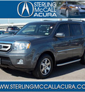 honda pilot 2011 dk  gray suv touring gasoline 6 cylinders front wheel drive automatic with overdrive 77074