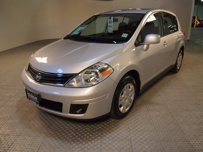 nissan versa 2011 silver hatchback 1 8 s gasoline 4 cylinders front wheel drive automatic 75219