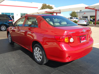 toyota corolla 2009 red sedan le gasoline 4 cylinders front wheel drive automatic 75067