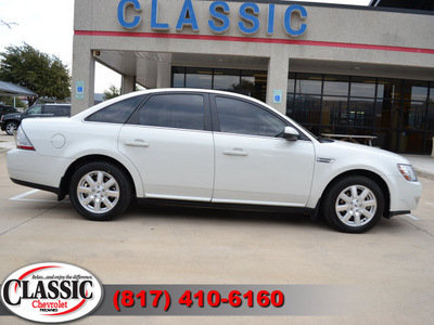 ford taurus 2009 white sedan se gasoline 6 cylinders front wheel drive automatic 76051