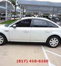 ford taurus 2009 white sedan se gasoline 6 cylinders front wheel drive automatic 76051