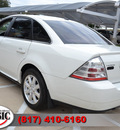 ford taurus 2009 white sedan se gasoline 6 cylinders front wheel drive automatic 76051