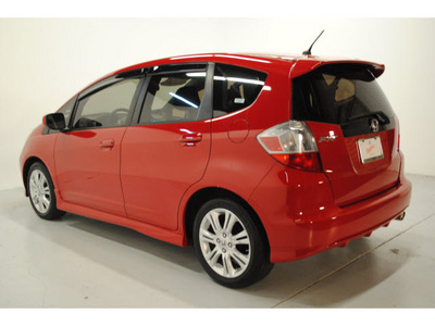 honda fit 2009 red hatchback sport gasoline 4 cylinders front wheel drive automatic 77025