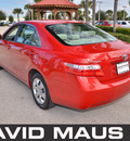 toyota camry 2009 red sedan le gasoline 4 cylinders front wheel drive automatic 32771