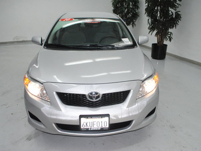 toyota corolla 2010 silver sedan le gasoline 4 cylinders front wheel drive automatic 91731