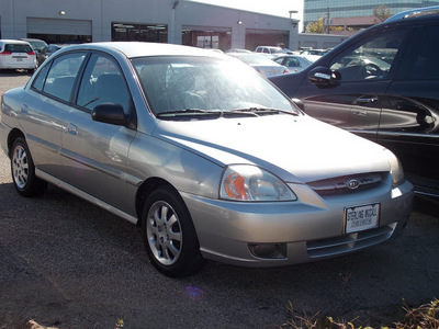 kia rio 2003 gray sedan gasoline 4 cylinders dohc front wheel drive 5 speed manual 77074