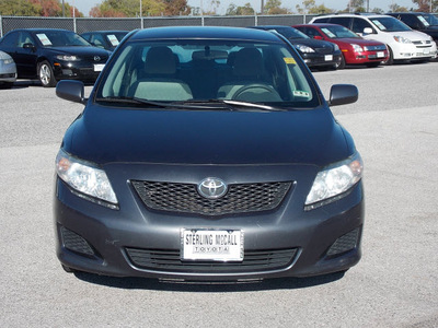 toyota corolla 2009 dk  gray sedan le gasoline 4 cylinders front wheel drive automatic with overdrive 77074
