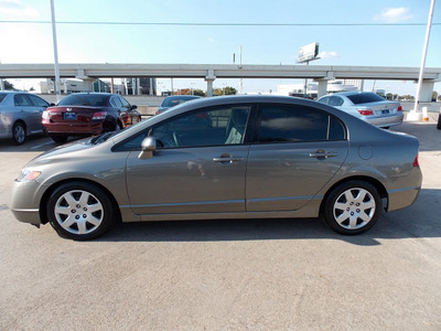 honda civic 2006 dk  gray sedan lx gasoline 4 cylinders front wheel drive automatic with overdrive 77074