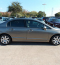 honda civic 2006 dk  gray sedan lx gasoline 4 cylinders front wheel drive automatic with overdrive 77074
