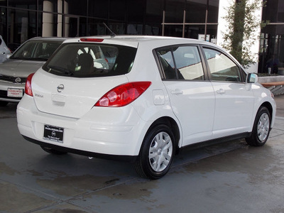 nissan versa 2011 white hatchback 1 8 s gasoline 4 cylinders front wheel drive automatic 77477