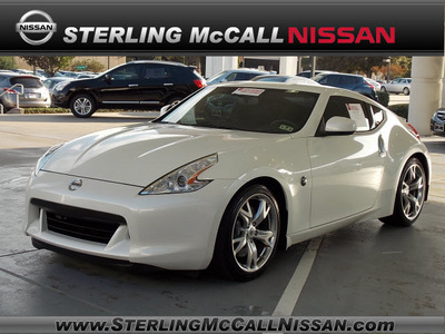nissan 370z 2009 white coupe touring gasoline 6 cylinders rear wheel drive 6 speed manual 77477