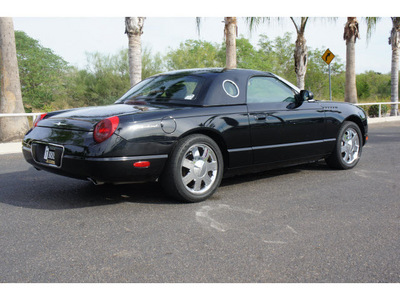 ford thunderbird 2002 black deluxe gasoline 8 cylinders rear wheel drive automatic 78550