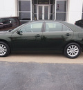 toyota camry 2010 green sedan xle gasoline 4 cylinders front wheel drive automatic with overdrive 77802