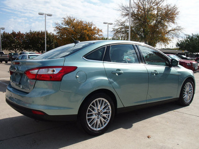 ford focus 2012 lt  blue sedan sel flex fuel 4 cylinders front wheel drive automatic 76011