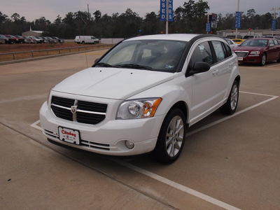 dodge caliber 2011 white hatchback heat gasoline 4 cylinders front wheel drive automatic 77656
