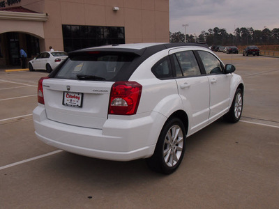 dodge caliber 2011 white hatchback heat gasoline 4 cylinders front wheel drive automatic 77656