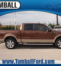 ford f 150 2011 brown lariat flex fuel 8 cylinders 4 wheel drive automatic 77375