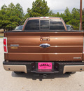 ford f 150 2011 brown lariat flex fuel 8 cylinders 4 wheel drive automatic 77375