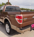 ford f 150 2011 brown lariat flex fuel 8 cylinders 4 wheel drive automatic 77375
