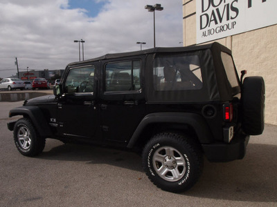 jeep wrangler unlimited 2009 black suv x gasoline 6 cylinders 2 wheel drive automatic with overdrive 76011