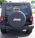 jeep wrangler unlimited 2010 black suv sport gasoline 6 cylinders 2 wheel drive automatic 33021