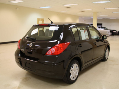 nissan versa 2011 dk  brown hatchback 1 8 s gasoline 4 cylinders front wheel drive automatic 27707