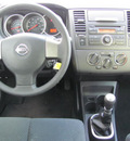 nissan versa 2012 black hatchback gasoline 4 cylinders front wheel drive manual 33884