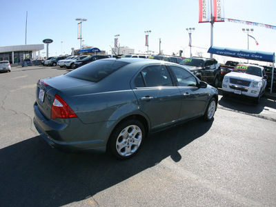 ford fusion 2011 teal sedan se gasoline 4 cylinders front wheel drive 6 speed manual 79925