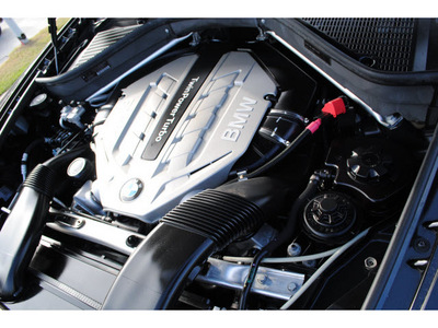 bmw x5 2011 black xdrive50i gasoline 8 cylinders all whee drive automatic 77002