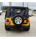 jeep wrangler 2006 yellow suv x gasoline 6 cylinders 4 wheel drive 6 speed manual 77706