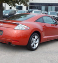 mitsubishi eclipse 2007 orange hatchback gs gasoline 4 cylinders front wheel drive shiftable automatic 77074