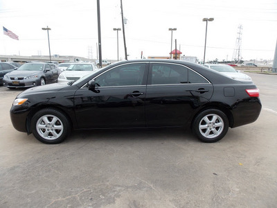 toyota camry 2009 black sedan le gasoline 4 cylinders front wheel drive automatic 77074