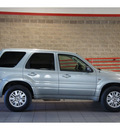 mercury mariner 2005 blue suv gasoline 6 cylinders all whee drive 4 speed automatic 79015