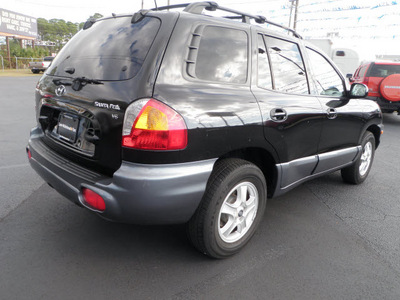 hyundai santa fe 2004 black suv gasoline 6 cylinders front wheel drive automatic 32401