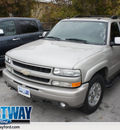 chevrolet tahoe 2004 silver suv z71 flex fuel 8 cylinders 4 wheel drive automatic 75062