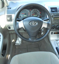 toyota corolla 2011 tan sedan le gasoline 4 cylinders front wheel drive automatic 75604