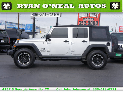 jeep wrangler unlimited 2009 silver suv x gasoline 6 cylinders 4 wheel drive steptronic 79110