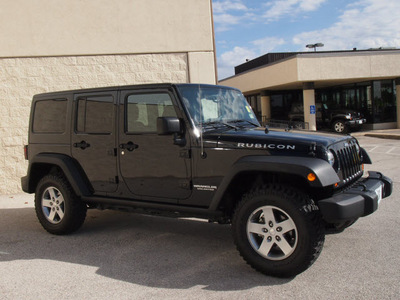 jeep wrangler unlimited 2012 black suv rubicon gasoline 6 cylinders 4 wheel drive automatic 76011