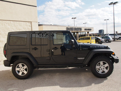 jeep wrangler unlimited 2012 black suv rubicon gasoline 6 cylinders 4 wheel drive automatic 76011