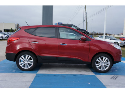 hyundai tucson 2013 dk  red limited gasoline 4 cylinders front wheel drive automatic 77094