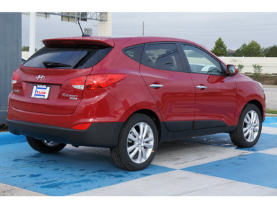 hyundai tucson 2013 dk  red limited gasoline 4 cylinders front wheel drive automatic 77094