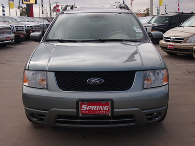 ford freestyle 2006 green suv limited gasoline 6 cylinders front wheel drive automatic 77388