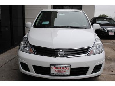 nissan versa 2012 white hatchback 1 8 s gasoline 4 cylinders front wheel drive automatic 77477