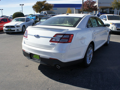 ford taurus 2013 white sedan sel gasoline 6 cylinders front wheel drive automatic 79407