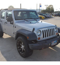 jeep wrangler unlimited 2010 silver suv sport gasoline 6 cylinders 2 wheel drive automatic 77090